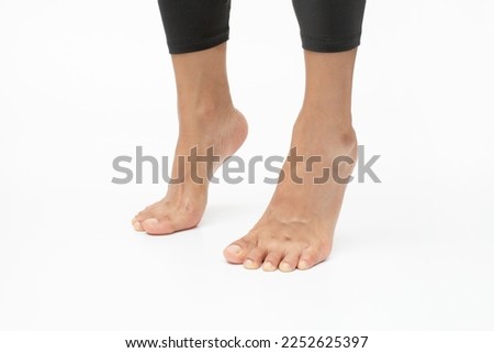 Stand tall on tip-toes. Foot exercises for flexibility and mobility