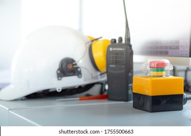 Standard construction safety equipment in control room, Construction and Red emergency stop switch reset button.Emergency button, stop the machine immediately when the accident.