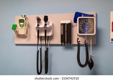 Standard Doctors Office Equipment Mounted To A Wall