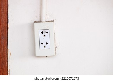 Standard Double Electrical Power Socket Setup on Old and Dirty Wall. - Shutterstock ID 2212871673