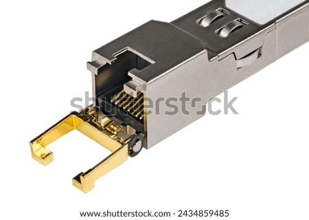 Standardized modular hot-pluggable network interface module on a white background. Close-up of metal compact small form-factor pluggable (SFP) transceiver with plug for registered jack connector RJ45.