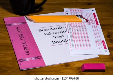 A Standardized Test Booklet And Scannable Scantron Answer Sheet With 5 Sharpened #2 Pencils With An Eraser.