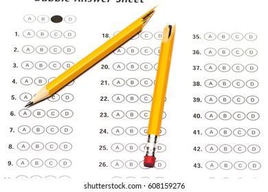 Standardized Test Form With Answers And A Broken Pencil.