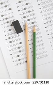 Standardized Test Form With Answers Bubbled In And A Pencil, Focus On Anser Sheet