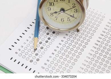 Standardized Test Form With Answers Bubbled In And A Pencil, Focus On Anser Sheet