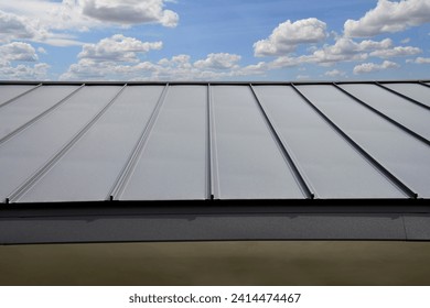 Standig Seam Metal Roof on sky background