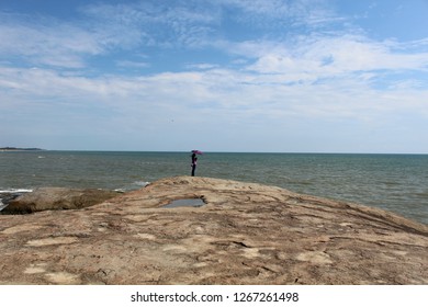 standing alone in beach