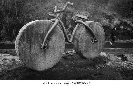 Standing Beside A Busy Cycle Route That Runs From Sunderland In England To Inverness In Scotland This Large Statue Of A Bicycle Looks On.