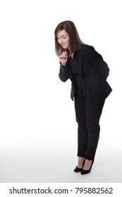 Standing Business Woman Looking Down At Something On The Ground 