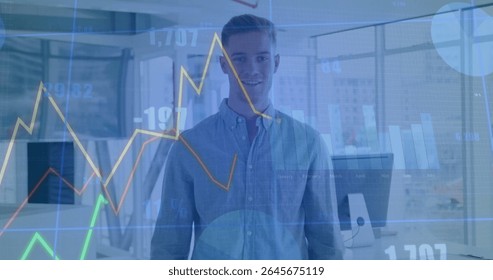 Standing button-up-shirted worker in open-plan office, with computers, line and bar chart overlay. Business, innovation, analytics, finance, productivity, technology, corporate