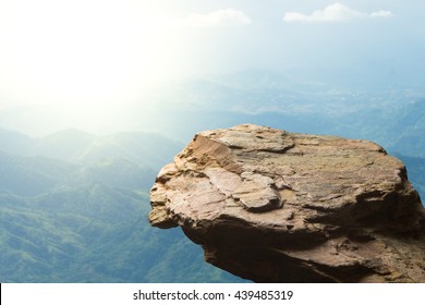 Standing empty on top of a mountain view, Blank space cliff edge with mountain on clouds blue sky - Shutterstock ID 439485319