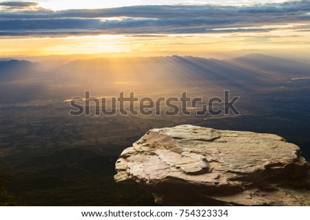 Standing empty on top of a mountain view, Blank space cliff edge with mountain on clouds blue sky