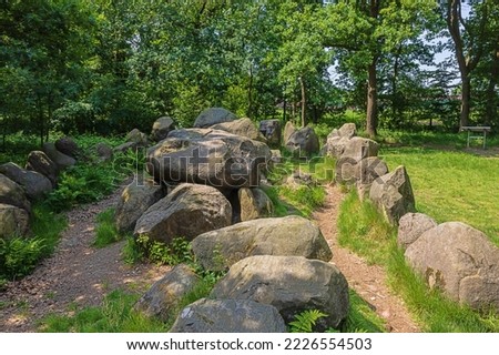 Standing an extremity of Dolmen 25a-c known as the Kleinenkneter Stones in Wildeshausen