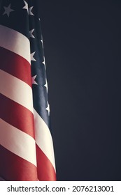 Standing flag United States of America on dark gray background.Banner of America in retro style - Shutterstock ID 2076213001
