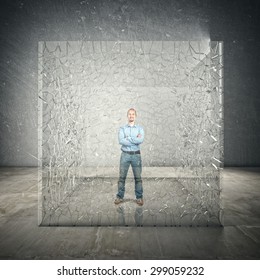 Standing Man Inside Broken Glass Cube