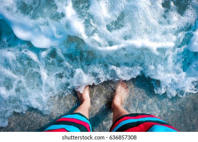 standing on the beach