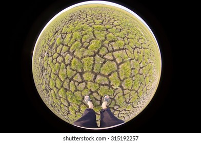 Standing On Cracked Earth By Circular Fish Eye Lens