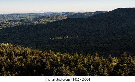 Standing On The Edge Of The Cliff On North Pack Monadnock Looking Over The Mountains Of The Wapack Range.