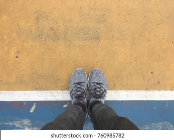 Standing on the line, from the blue place to the yellow place, go to the new place or stay at the same, change your mind concept