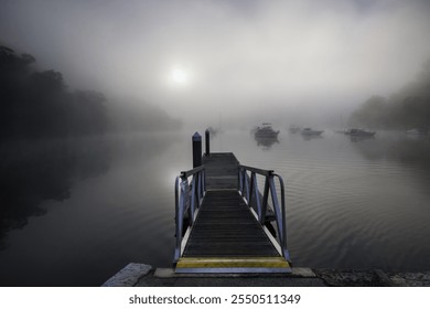 Standing on  the pier on a misty river sunrise morning - Powered by Shutterstock