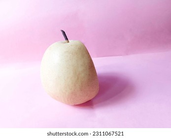 A standing pear
on pink background. pear slice - Shutterstock ID 2311067521