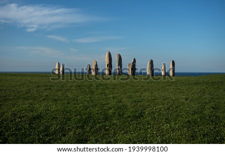 Standing stone granite sculptures art installation menhir park in A Coruna Galicia in Spain