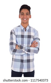 Standing teenager with crossed arms in a casual outfit, isolated on a white background.