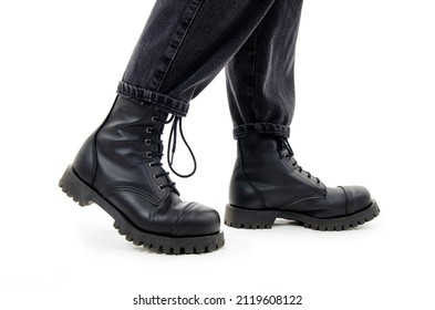 Standing Woman Wearing Combat Boots. Isolated On White Background. Side View.