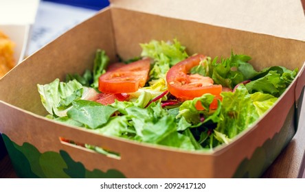 Stanislawice, Poland - May 30, 2021: Healthy Food At Mcdonalds Restaurant. Salad In A Paper Box. Shallow Depth Of Field.