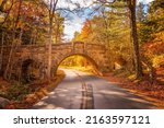 The Stanley Brook Bridge in the Acadia National PArk on a sunny fall day