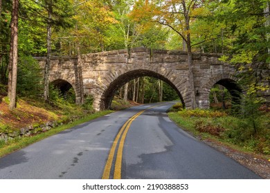 Stanley Brook Bridge - A wide-angle Autumn morning view of triple-arched Stanley Brook Bridge, one of sixteen Rockefeller's unique carriage-road stone-faced bridges, in Acadia National Park, ME, USA.