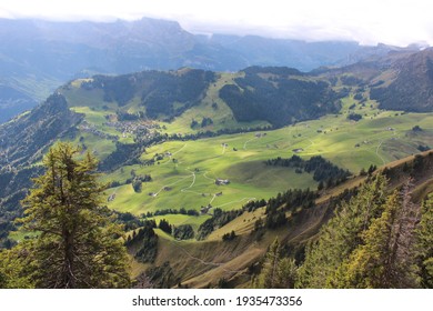 Stanserhorn Mountain, Stans, Switzerland:19 September 2015: A breathtaking Day taking the  funicular railway and roofless CabriO Cable Car up the Stanserhorn Mountain in Switzerland - Shutterstock ID 1935473356