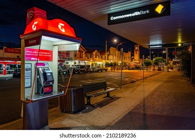 Stanthorpe, Queensland, Australia - Jan 4, 2022: Telstra landline phone booth illuminated at night