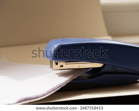 Stapler for paper medium shot selective focus