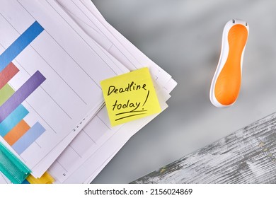 Stapler With Work Papers And Sticky Note. Deadline Today Concept.