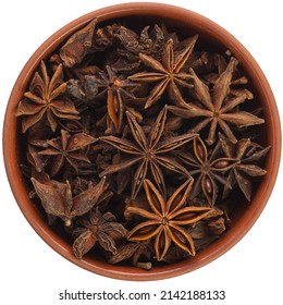 Star Anise In A Brown Ceramic Bowl Isolated On White Background. Isolated Close-up Photo Of Food Close Up From Above On White Background.