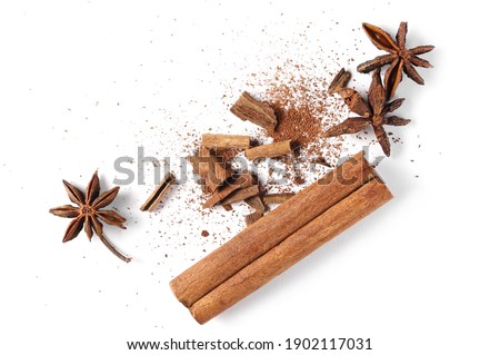 Star anise and cinnamon stick isolated on white background, top view 