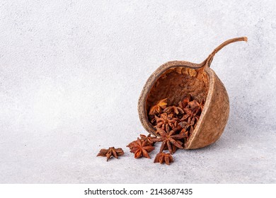 Star Anise Spills Out Of Bizarre Dried Fruits Of Exotic Buddha Tree, Copy Space