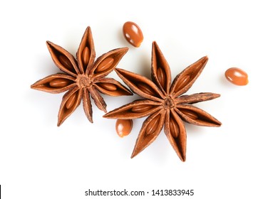 Star anise. Two star anise fruits with three seeds. Macro close-up Isolated on white background with shadow, top view of chinese badiane spice or Illicium verum. - Powered by Shutterstock