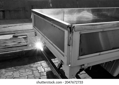 Star Burst Reflected From A Shiny Polished Rear End Of A Pickup Truck