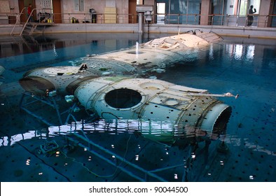 STAR CITY, RUSSIA - AUGUST 21: Russian Segment Mockup Of International Space Station Descends On The Platform At Russian Hydrolab Water Immersion Facility August 21, 2009 In Star City, Russia