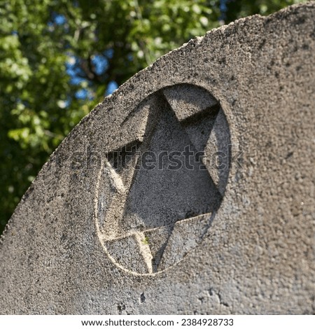  Star of David on the upper part of a gravestone in a Jewish cemetery in Prague                              