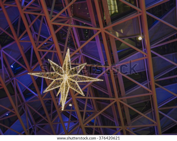 Star Lights Hanging On Ceiling Construction Stock Photo