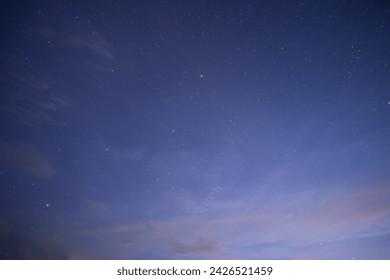 A star at nigh sky with cloudy