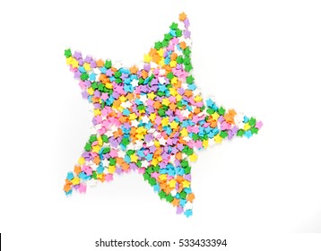 Star Shaped Assorted Rainbow Colored Sprinkles Isolated On White Background