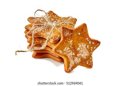 Star shaped ginger cookies stack tied with rope on white - Powered by Shutterstock