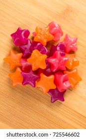 Star Shaped Jelly Candy On A Wood Background