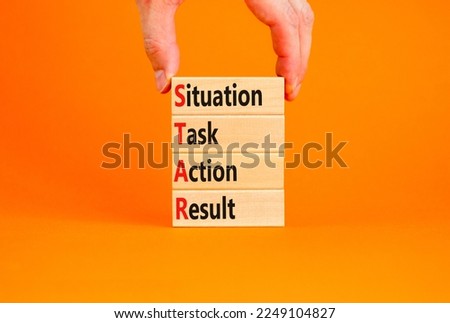 STAR situation task action result symbol. Concept words STAR situation task action result on wooden block on beautiful orange background. Business STAR situation task action result concept. Copy space