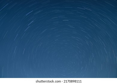 Star Trails In The Clear Night Sky In The City