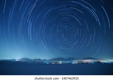 Star trails over Mt. Hiruzen and Mt. Daisen in winter